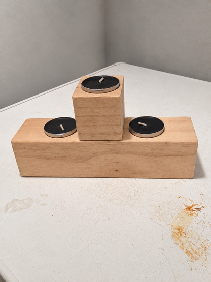 rustic wooden candle display | three candle wooden stand | handmade wood candle décor | solid wood candle centerpiece | decorative wooden candle rack | natural wood home accent | farmhouse table candle holder | handcrafted wooden décor | wooden candle stand for table | elegant triple candle display